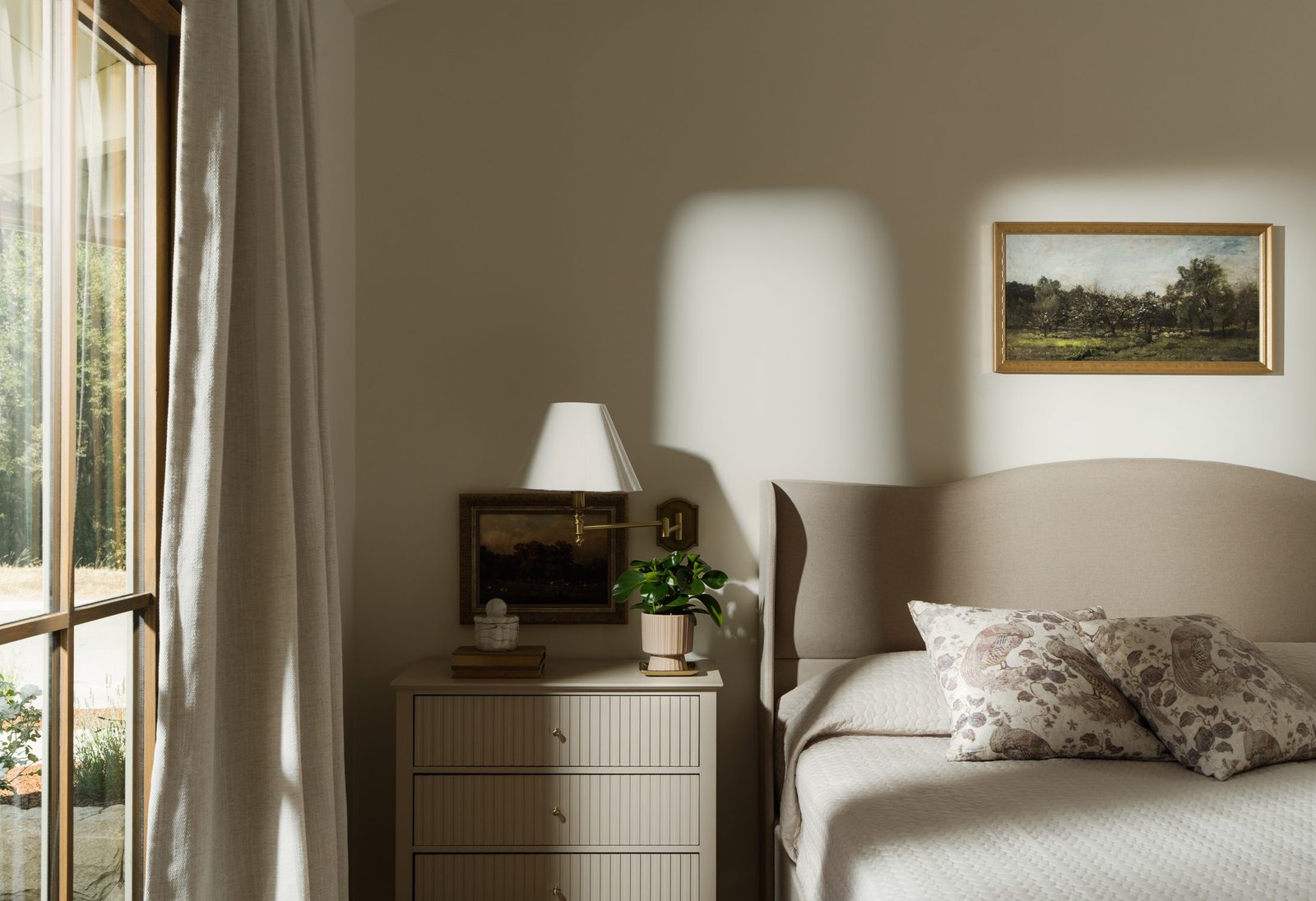 Bedroom with a sitting area and sofa