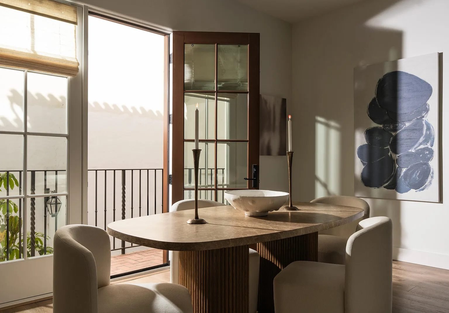 Dining nook with a banquette and windows