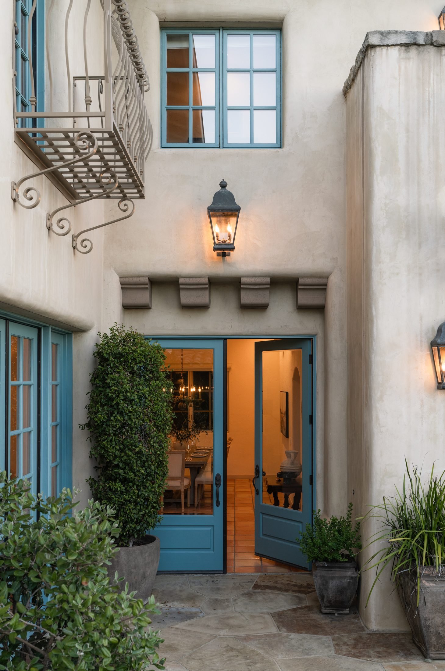 Spanish courtyard exterior with blue doors